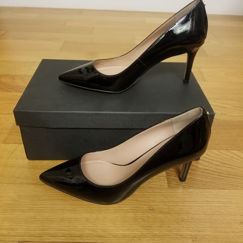 BCBGeneration black laquered pumps never worn s 7